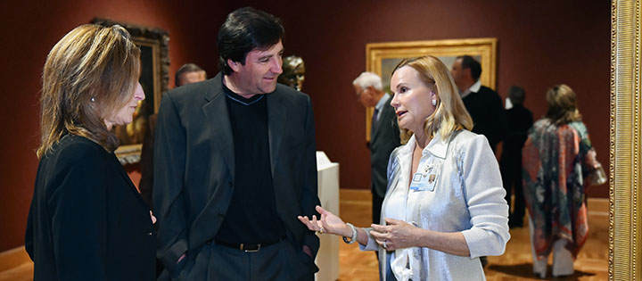 Members and guests connect at a museum gathering.