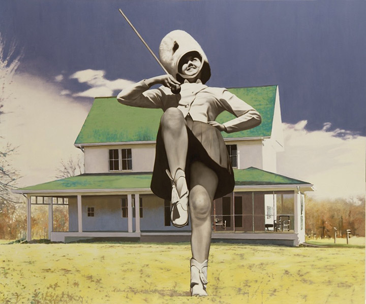 color image of a farm house with a green roof with an oversized majorette rendered in black and white in the foreground