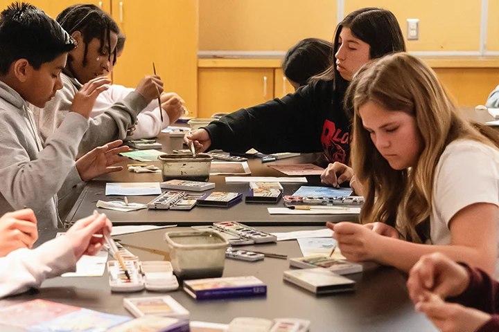 photo of youths crafting at a table